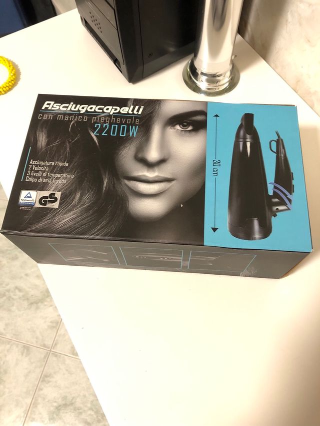 Asciugacapelli con manico pieghevole