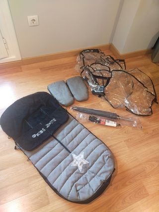 Saco,guantes,sombrilla y burbuja de bebe