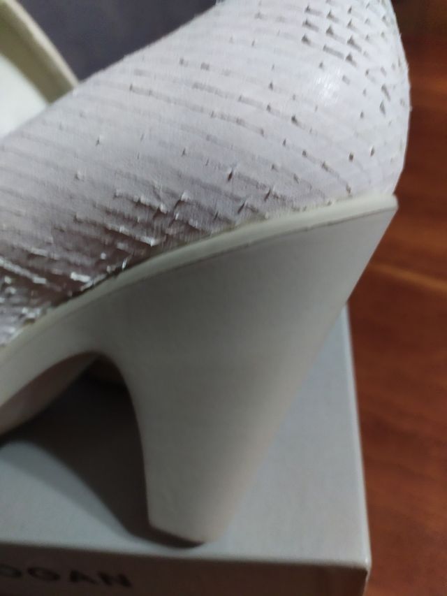 Décolleté donna Hogan in pelle pitonata