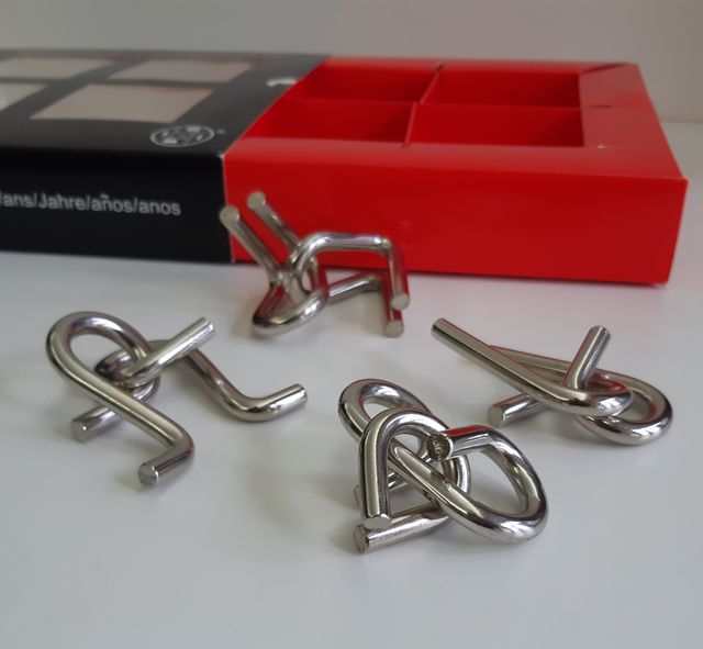 Jogo Quatro Quebra Cabeças Puzzles Metálicos