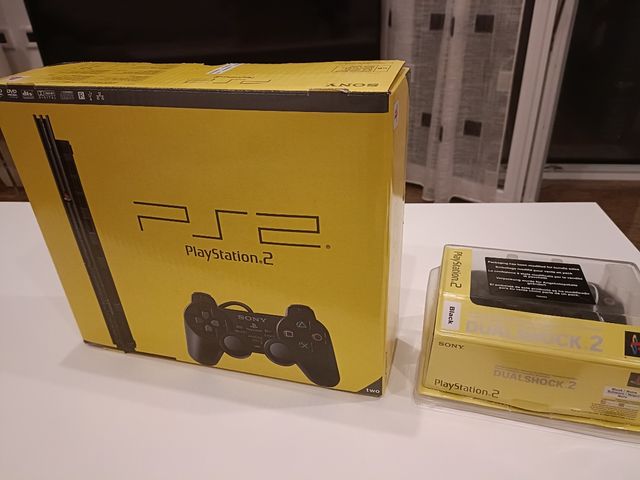 PS2 + 10 Giochi e Accessori
