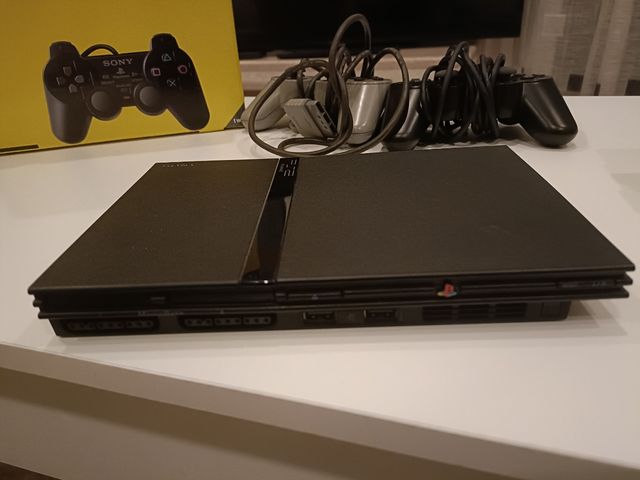 PS2 + 10 Giochi e Accessori