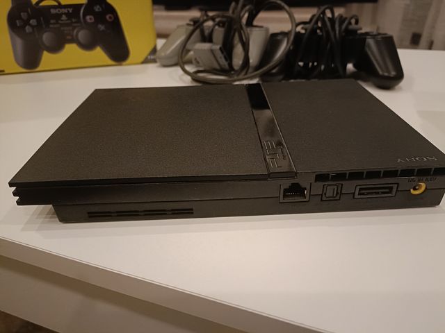 PS2 + 10 Giochi e Accessori