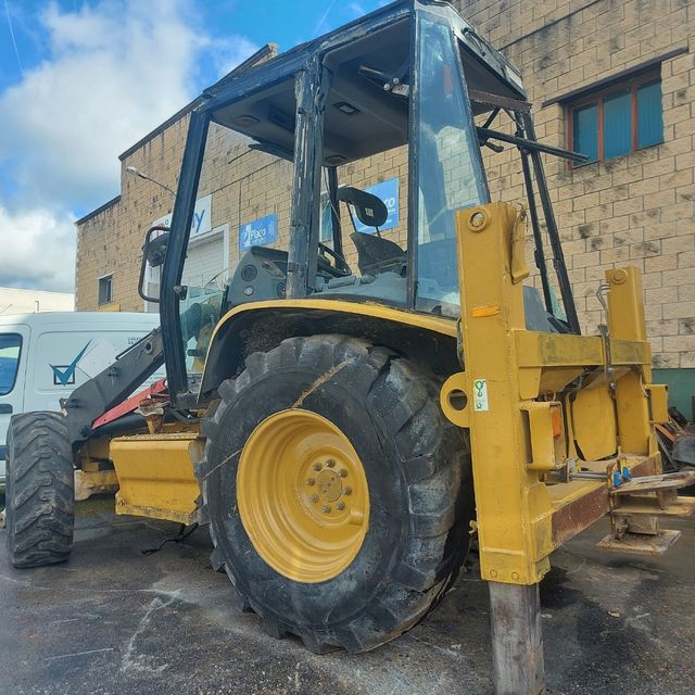 llanta trasera vaterpillar 428d