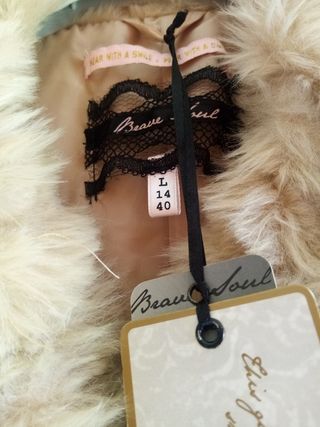 Abrigo de pelo en color beige