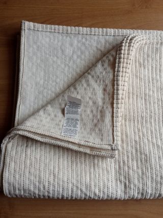 Protector de sofá, colcha.