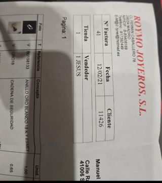 Anillo oro blanco 18k y esmeralda