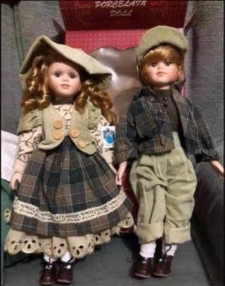 Coppia di bambole in porcellana biscuit