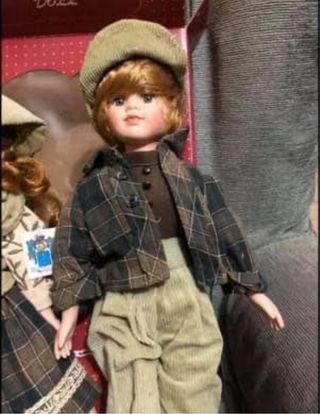 Coppia di bambole in porcellana biscuit