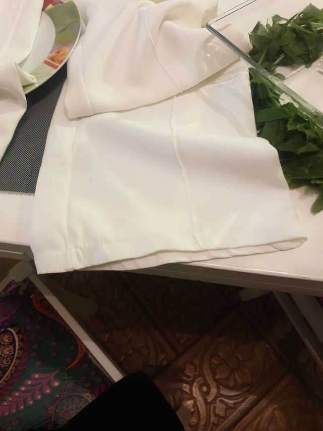 Pantaloni bianchi eleganti a zampa