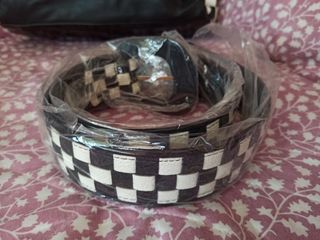 Bolso y cinturón Cristian Lay