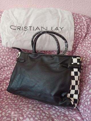 Bolso y cinturón Cristian Lay