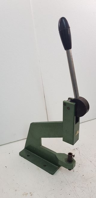 Útil prensa manual