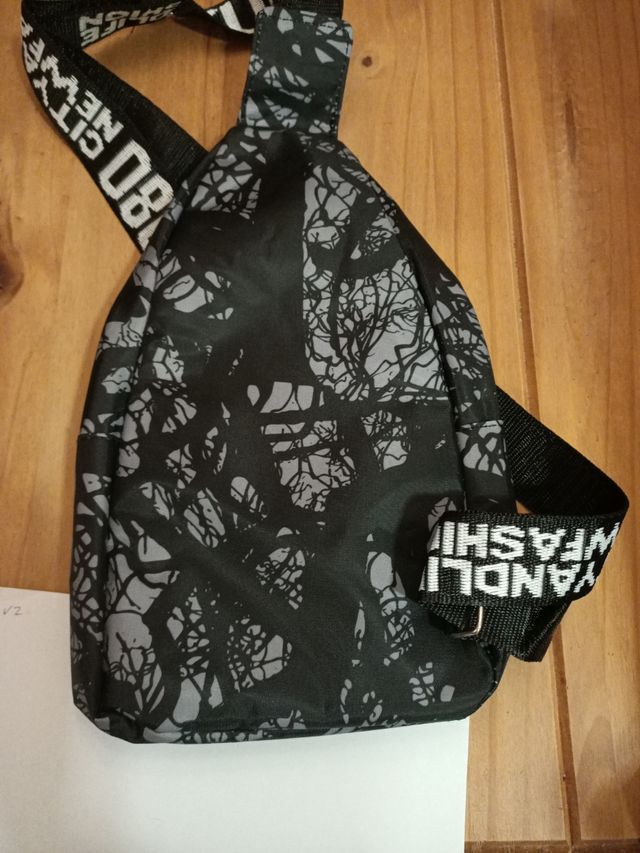 Bandolera negra nueva