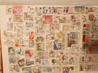 COLECCIÓN DE SELLOS DEL MUNDO Y ARCHIVADOR