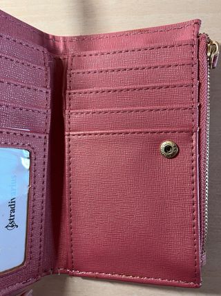 Monedero rosa de Stradivarius nuevo