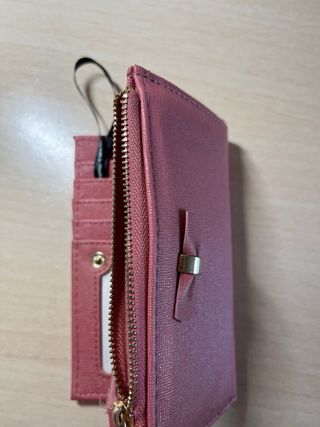 Monedero rosa de Stradivarius nuevo