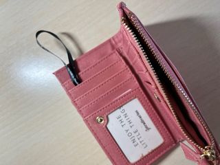 Monedero rosa de Stradivarius nuevo