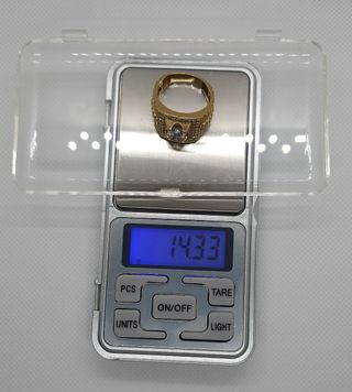 Anillo de oro 18 kilates y circonitas