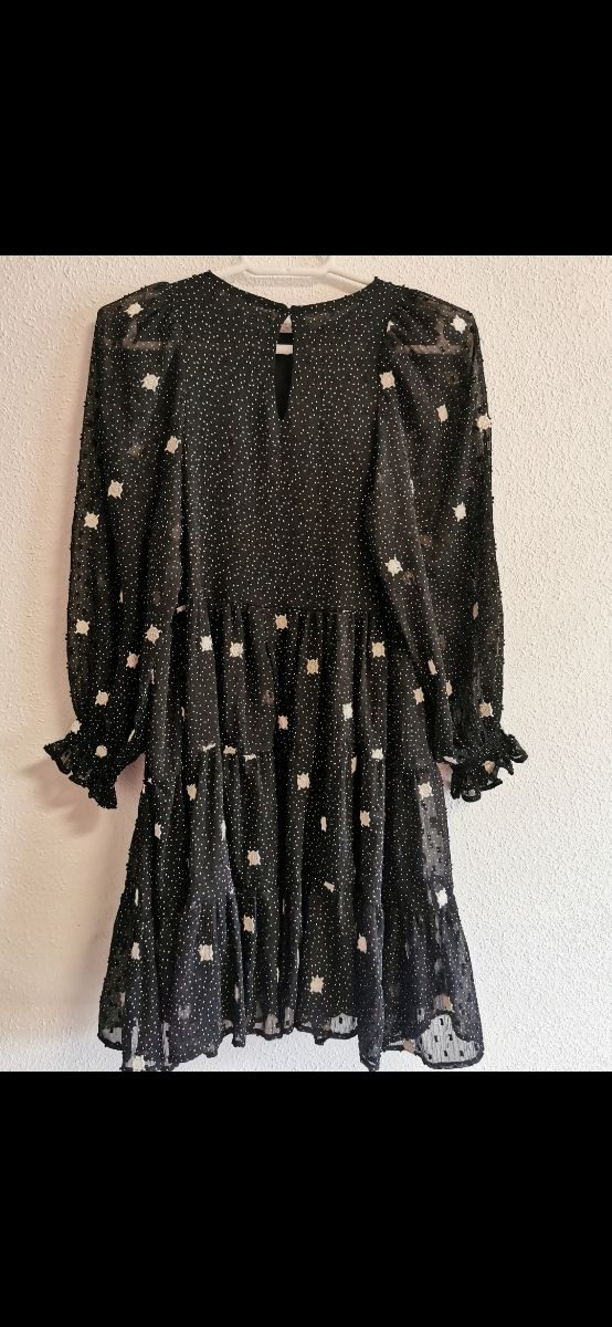 Vestido de niña en la talla 9 años de Zara.