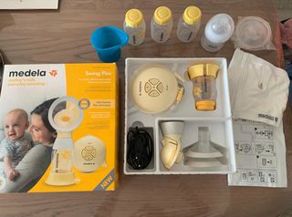Sacaleche Medela Swing Flex + extras