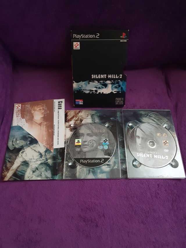 PlayStation 2 Slim + Juegos y accesorios.