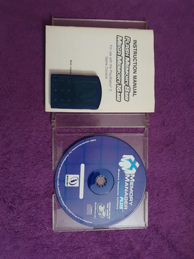 PlayStation 2 Slim + Juegos y accesorios.