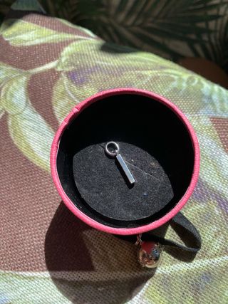 colgante de plata Tous grabado con la marca