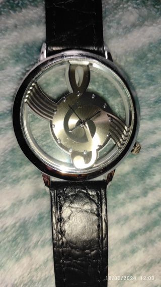 Reloj clave de sol