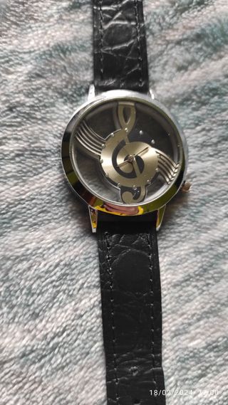Reloj clave de sol