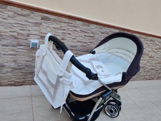 Cochecito bebecar marrón muy bien conser
