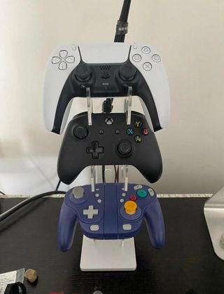 Soporte mandos + auriculares consolas