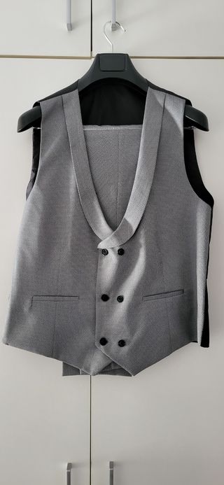 Traje nuevo de tachos