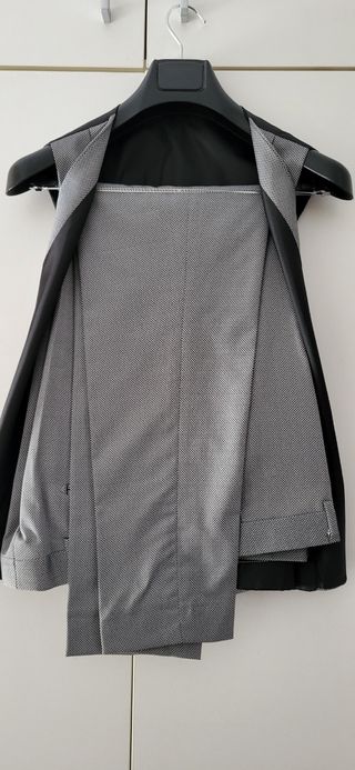 Traje nuevo de tachos