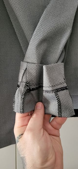 Traje nuevo de tachos