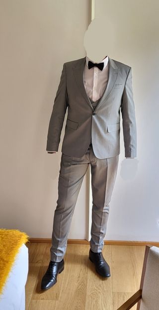 Traje nuevo de tachos