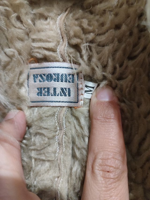 Abrigo largo con pelo por dentro