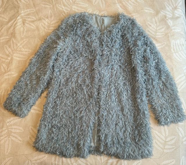 abrigo fino de plumas