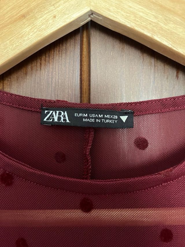 Blusa lunares semitransparente