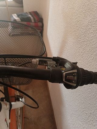 bicicleta naranja y blanca para ADOLESCENTE