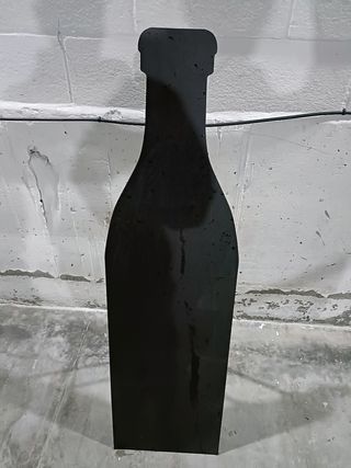 Pizarra con forma de botella