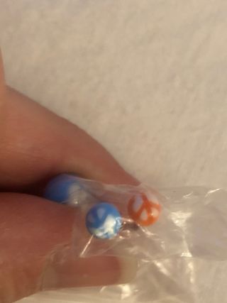 Piercing ombligo simbolo paz