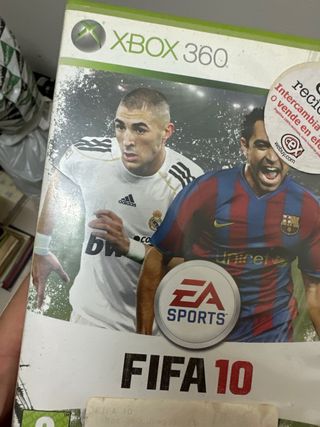 Xbox 360 con 2 mandos y 2 juegos