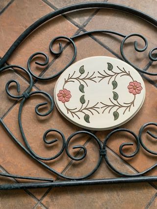 Cabecero de hiello forjado con flores decorativas