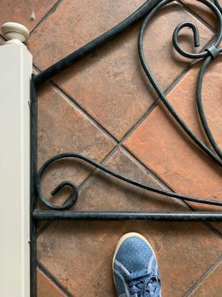 Cabecero de hiello forjado con flores decorativas