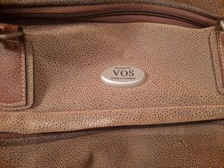 Maleta de viaje con ruedas de  cuero