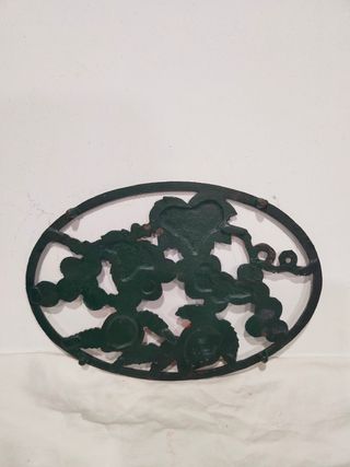 Antiguo salvamanteles reposaollas hierro fundido