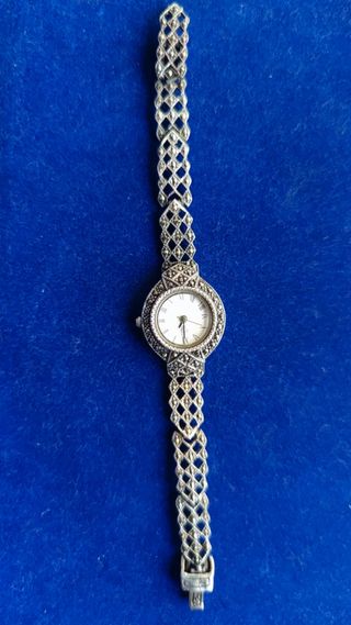 Varios relojes de plata antigua .