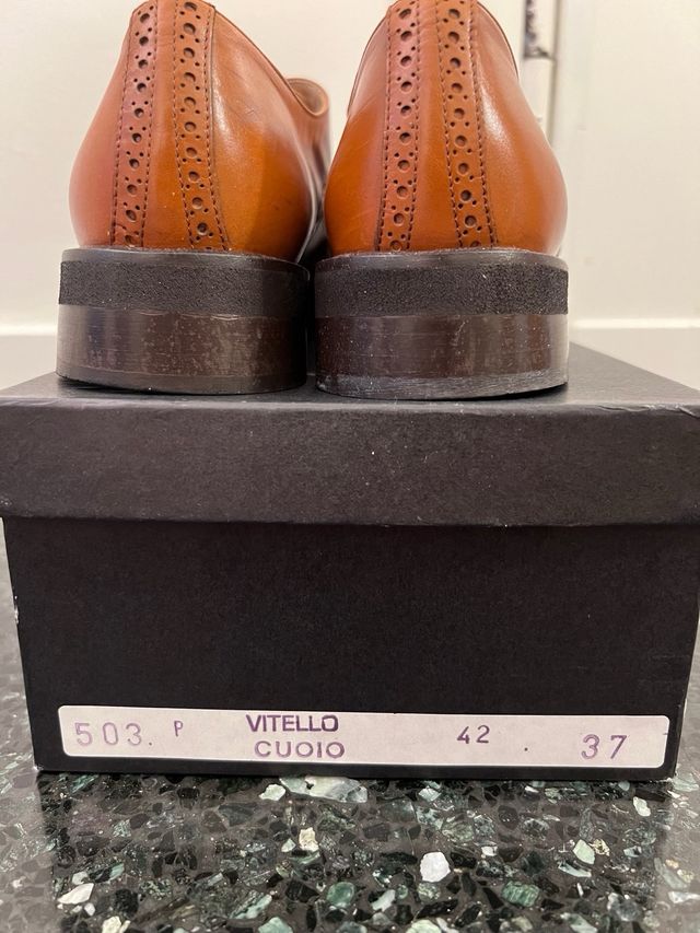 Scarpe di pelle con lacci