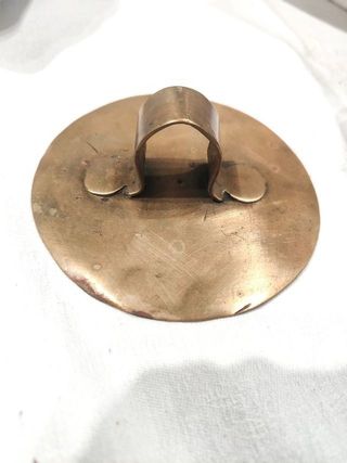 Tapa de broce antigua
